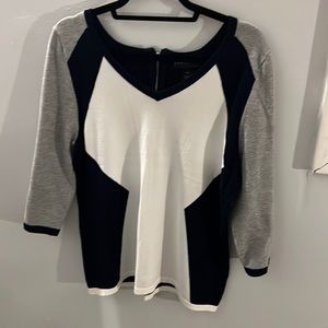 Color block sweater with zipper on back